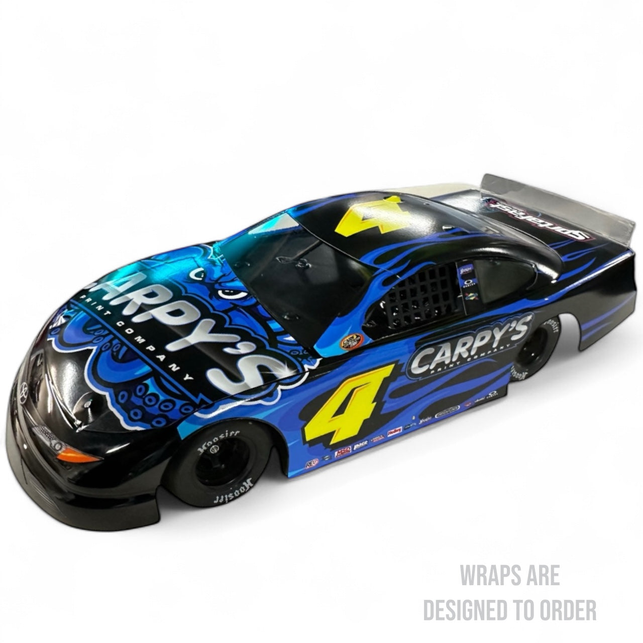 R/C car with blue and black design featuring 'Carpy's' branding on a white background.