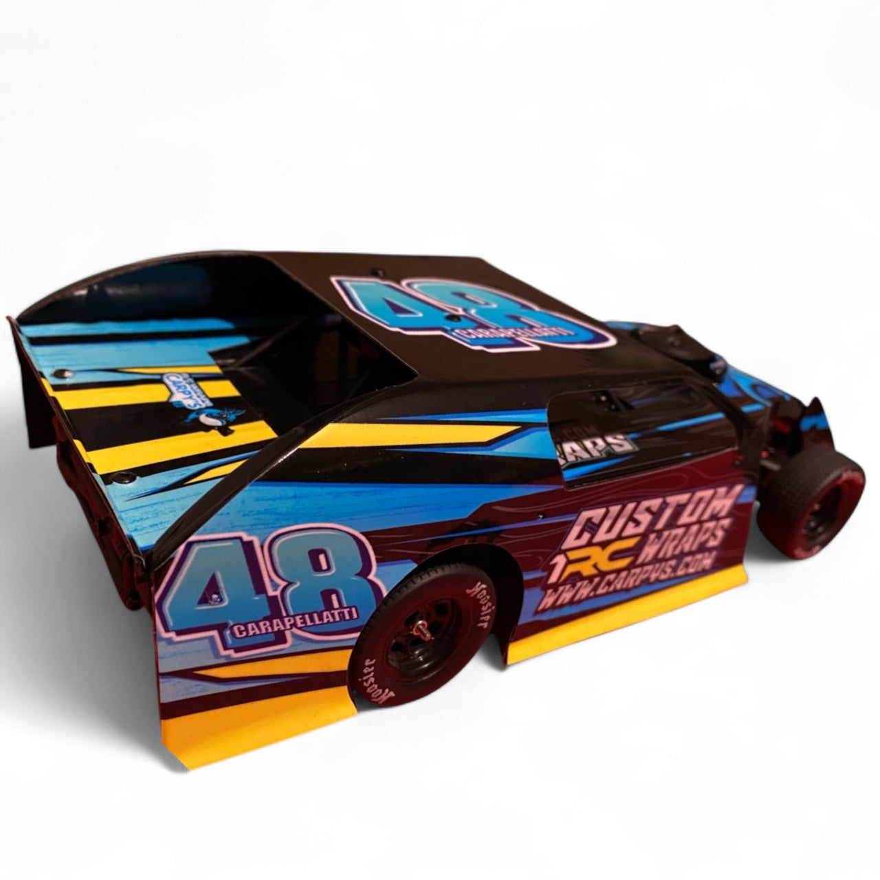 Colorful RC car with custom wrap design on a white background