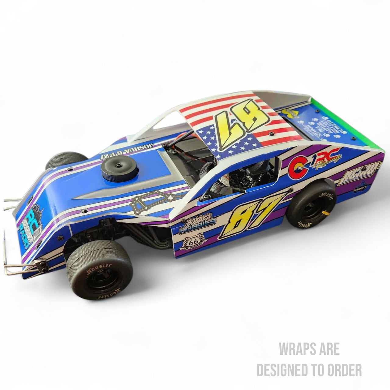 Colorful modified ace car with detailed graphics wrap on a white background