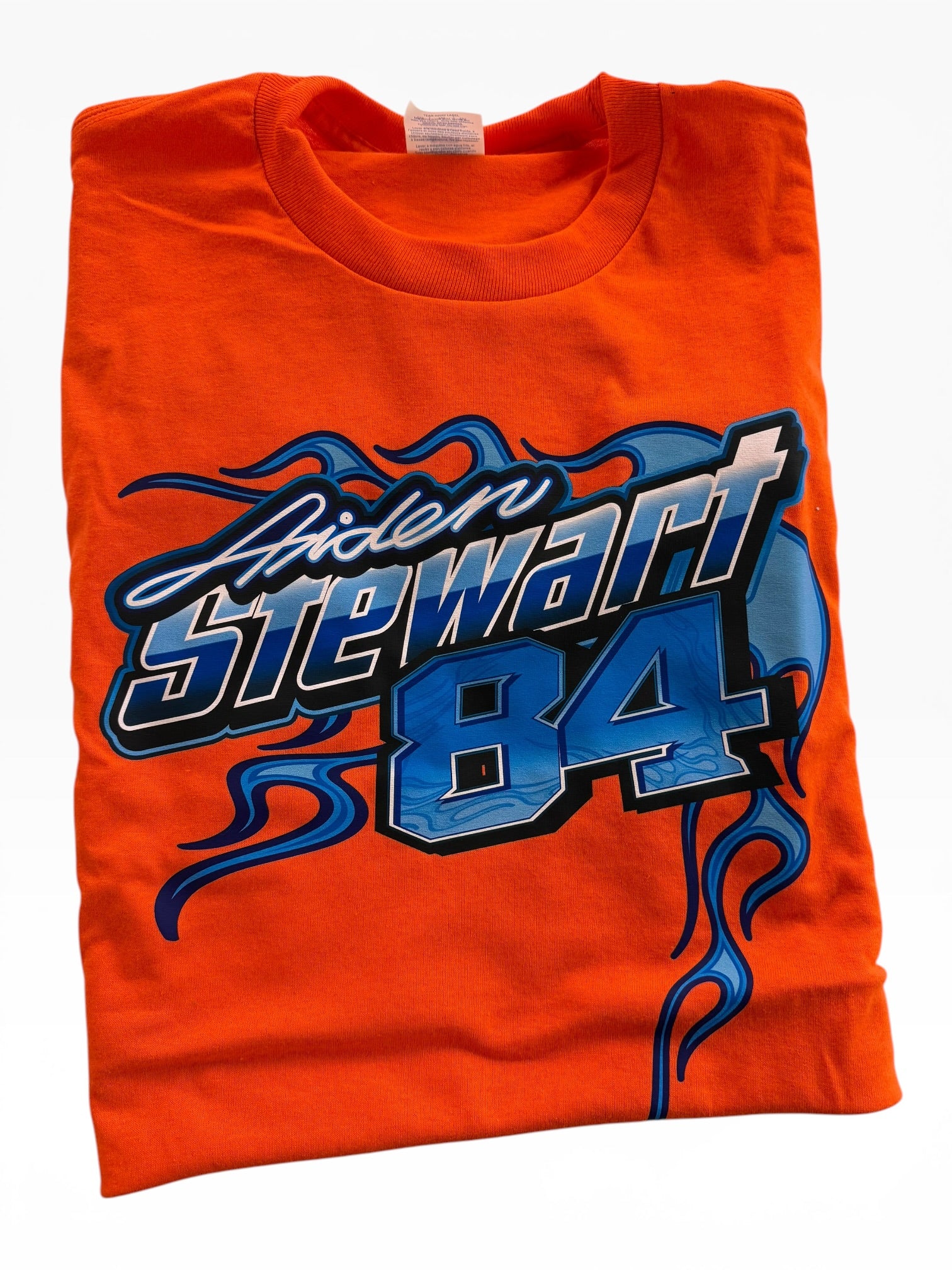 Orange t-shirt with 'Stewart 84' design on a white background