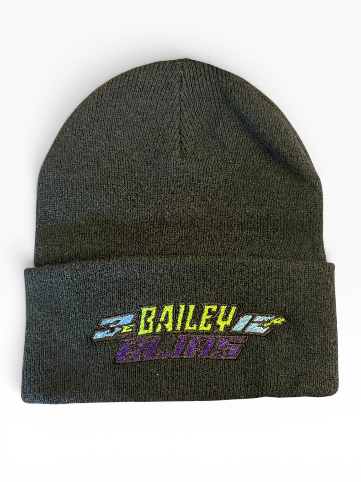 Dark green beanie with embroidered text on a white background kart racing