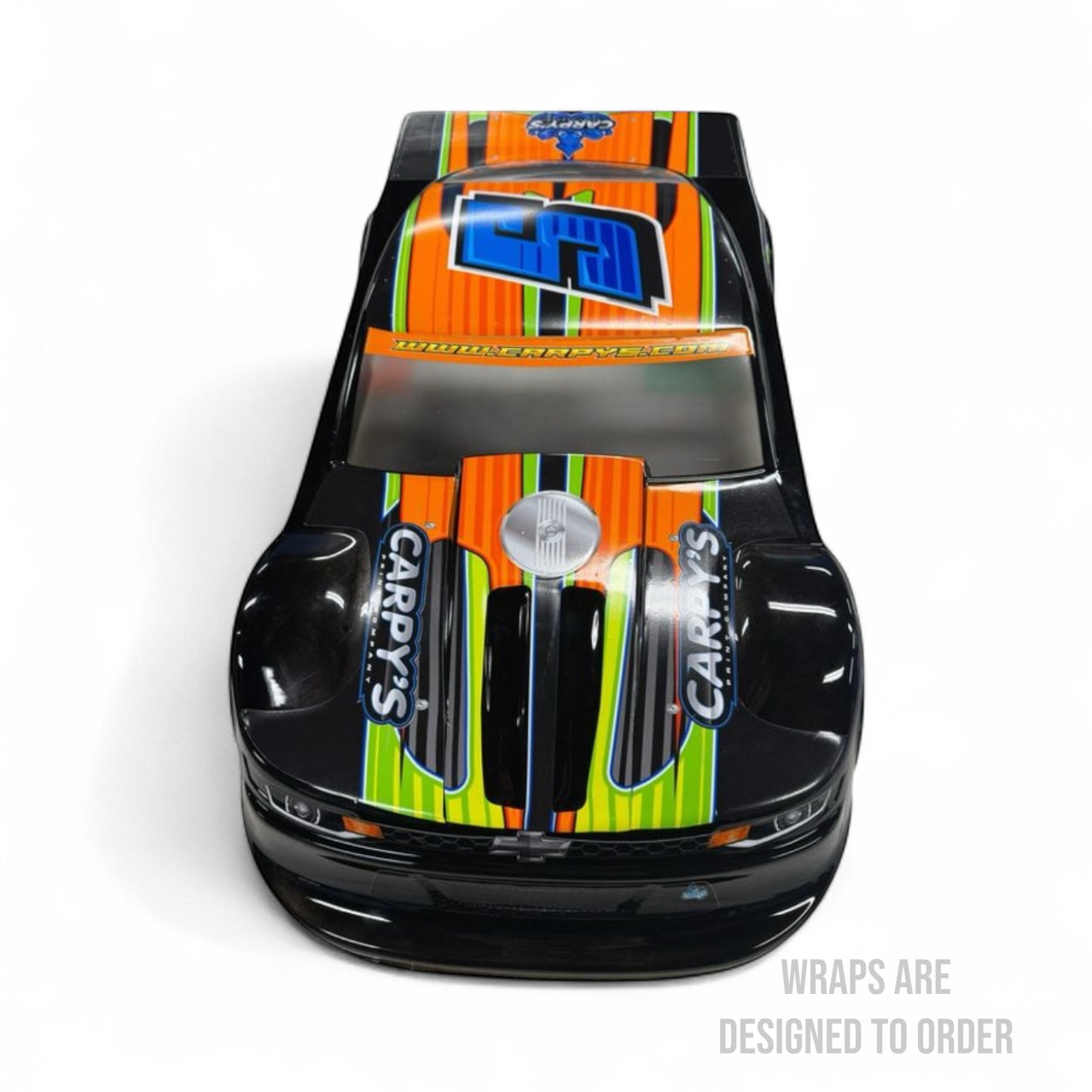 Car with colorful wrap design on a white background