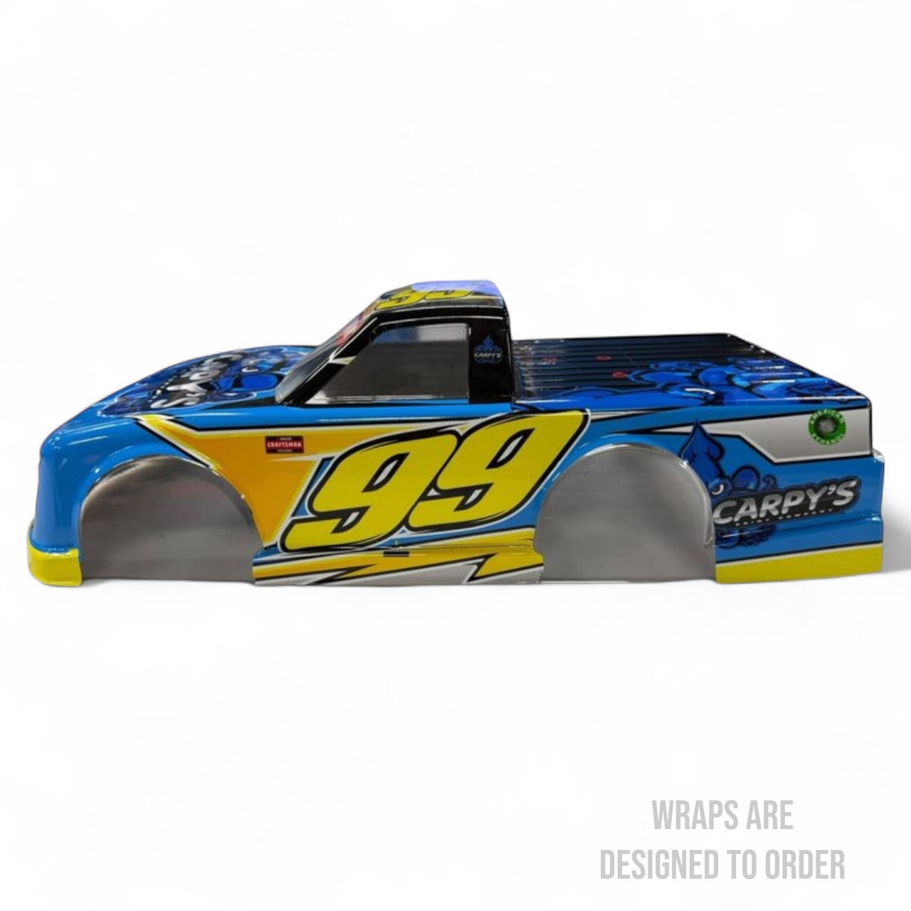 RC truck with blue and yellow design on a white background