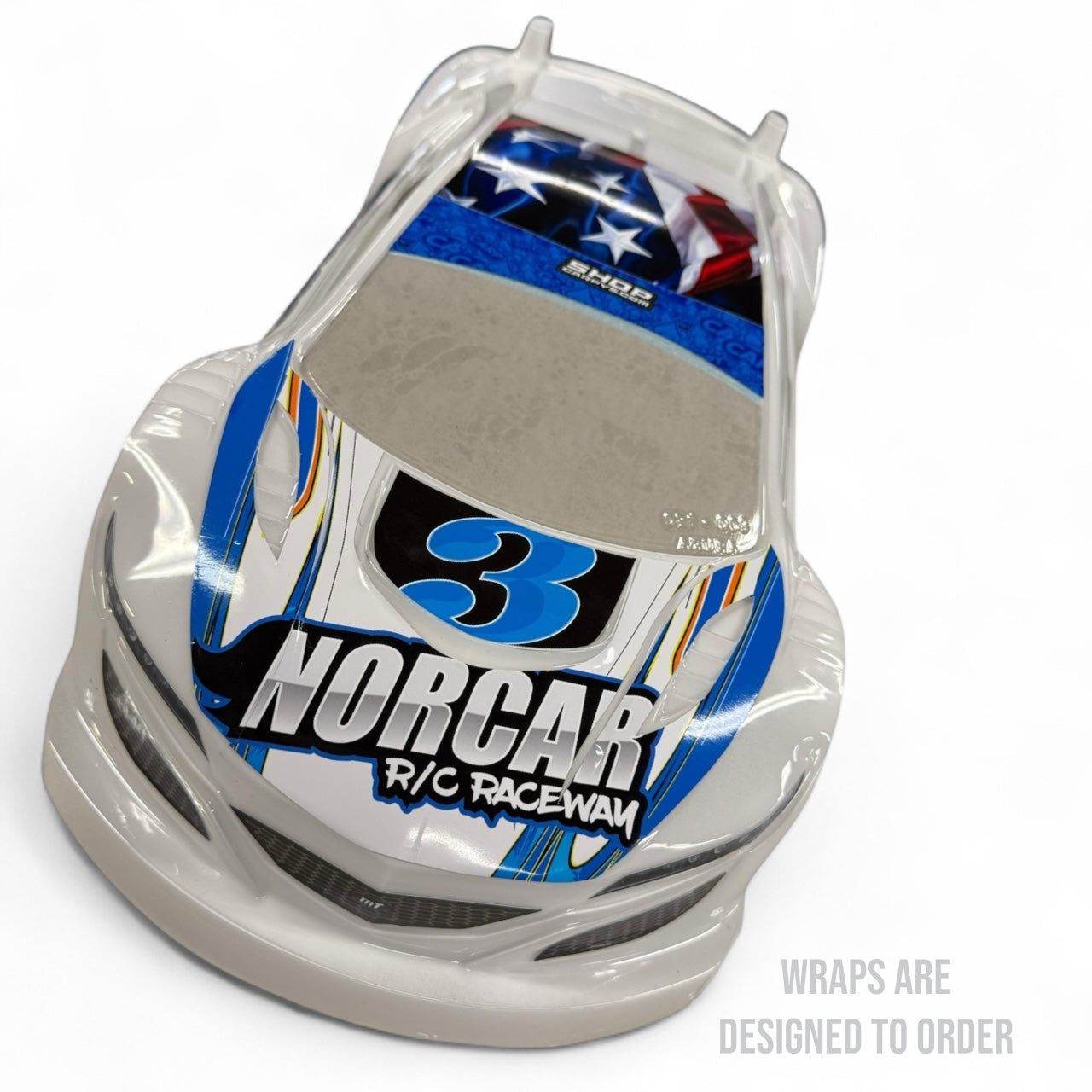 R/C car body with Norcar R/C Raceway branding on a white background