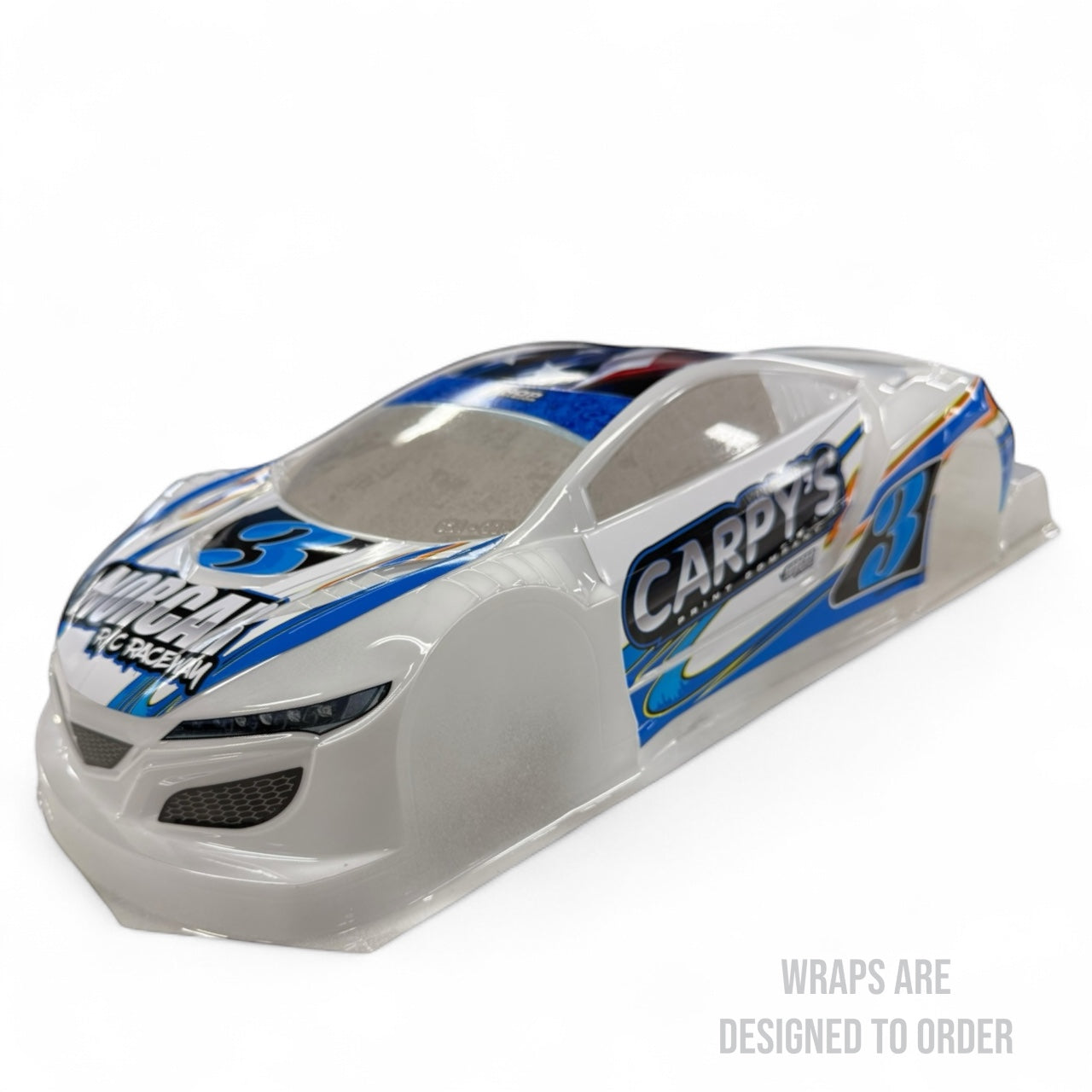 RC car body with blue and white graphics on a white background