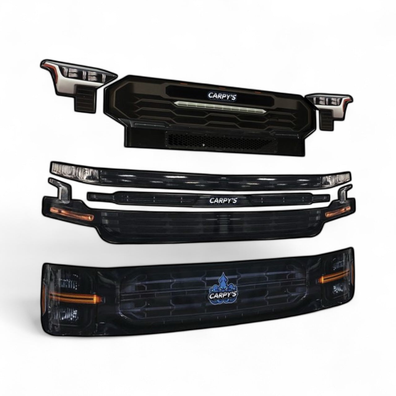 Car parts including headlights and grills with 'Carpys' branding on a white background