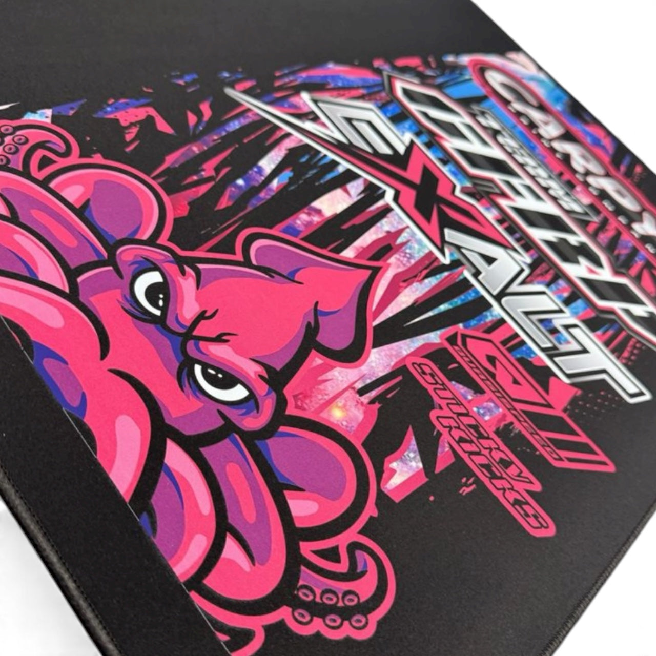 pit mat  with a pink and black design featuring a stylized character and text.