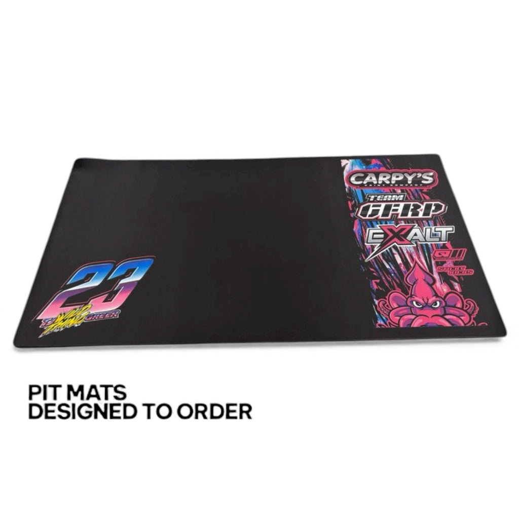 Black pit mat with colorful graphics and text on a white background