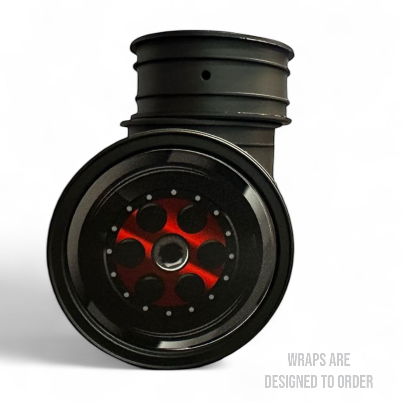 Black wheel with red center on a white background