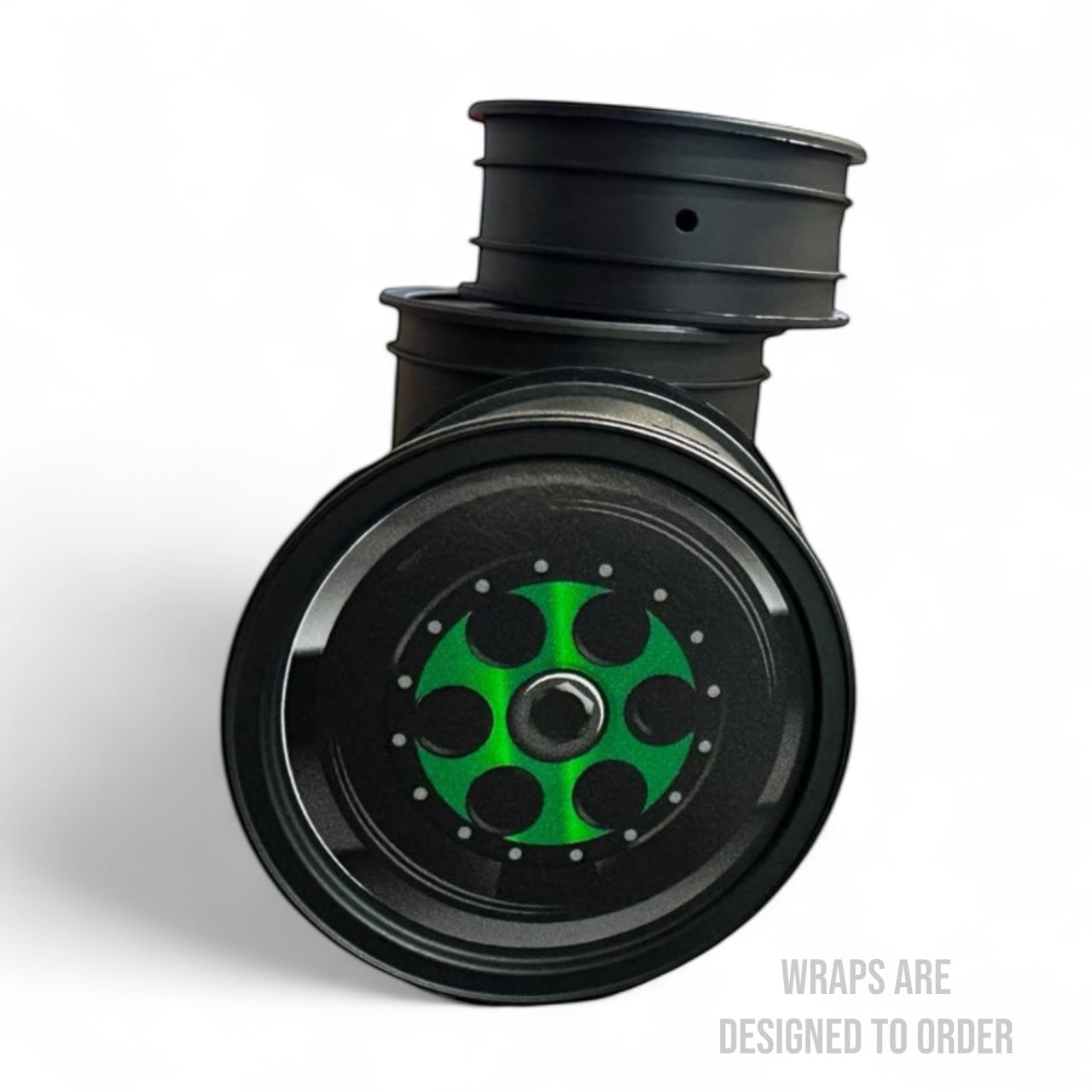Black wheel with green center on a white background
